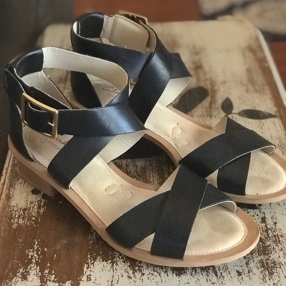 Clark’s black leather sandal